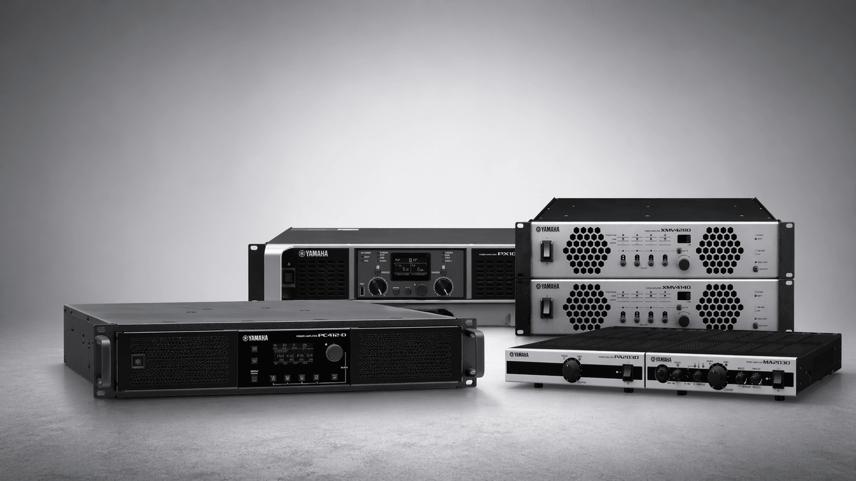 Rack-mounted Yamaha amplifiers displayed in a clean promotional banner.