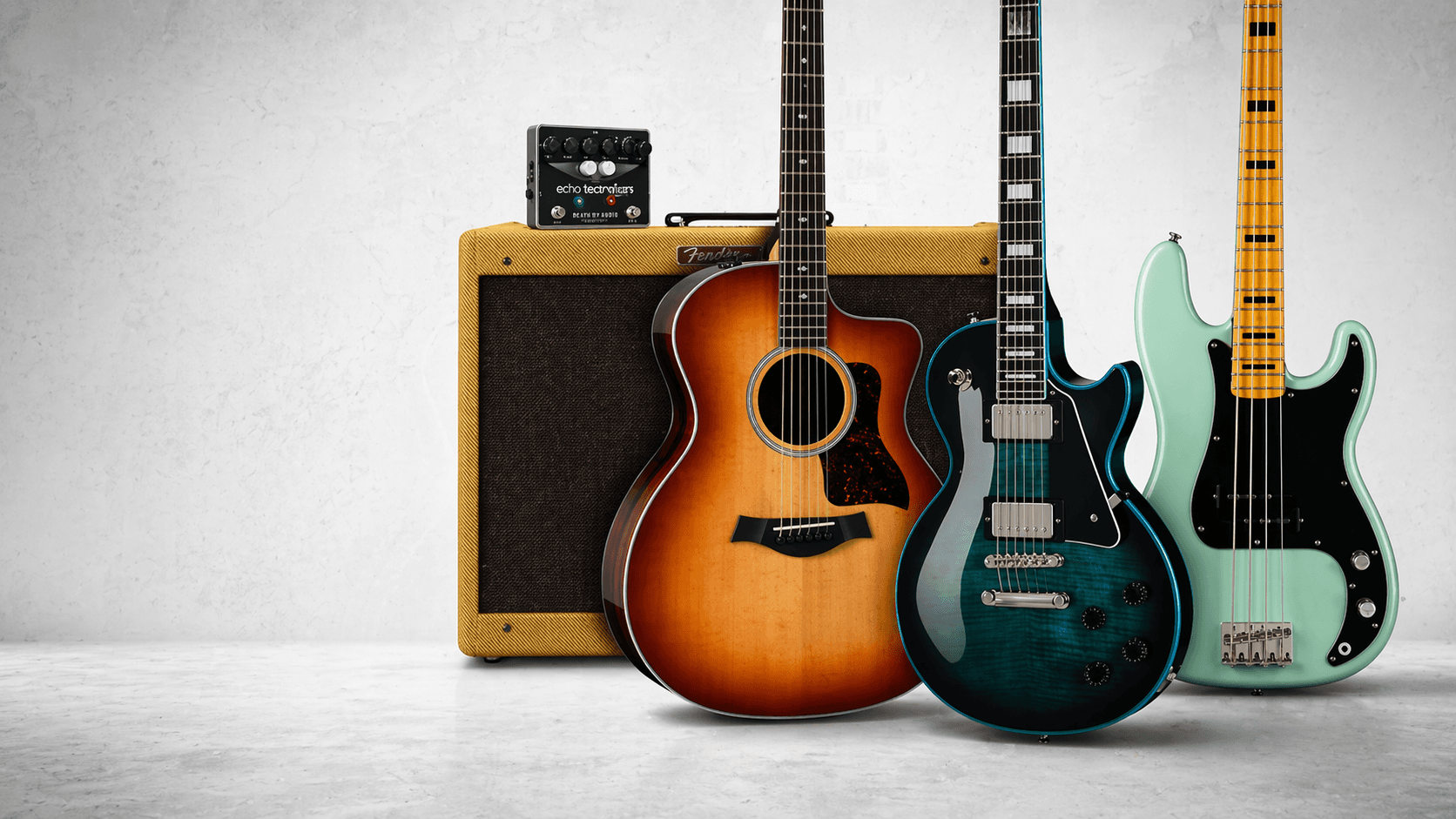 A guitar, bass, and amplifier setup arranged in a product banner.